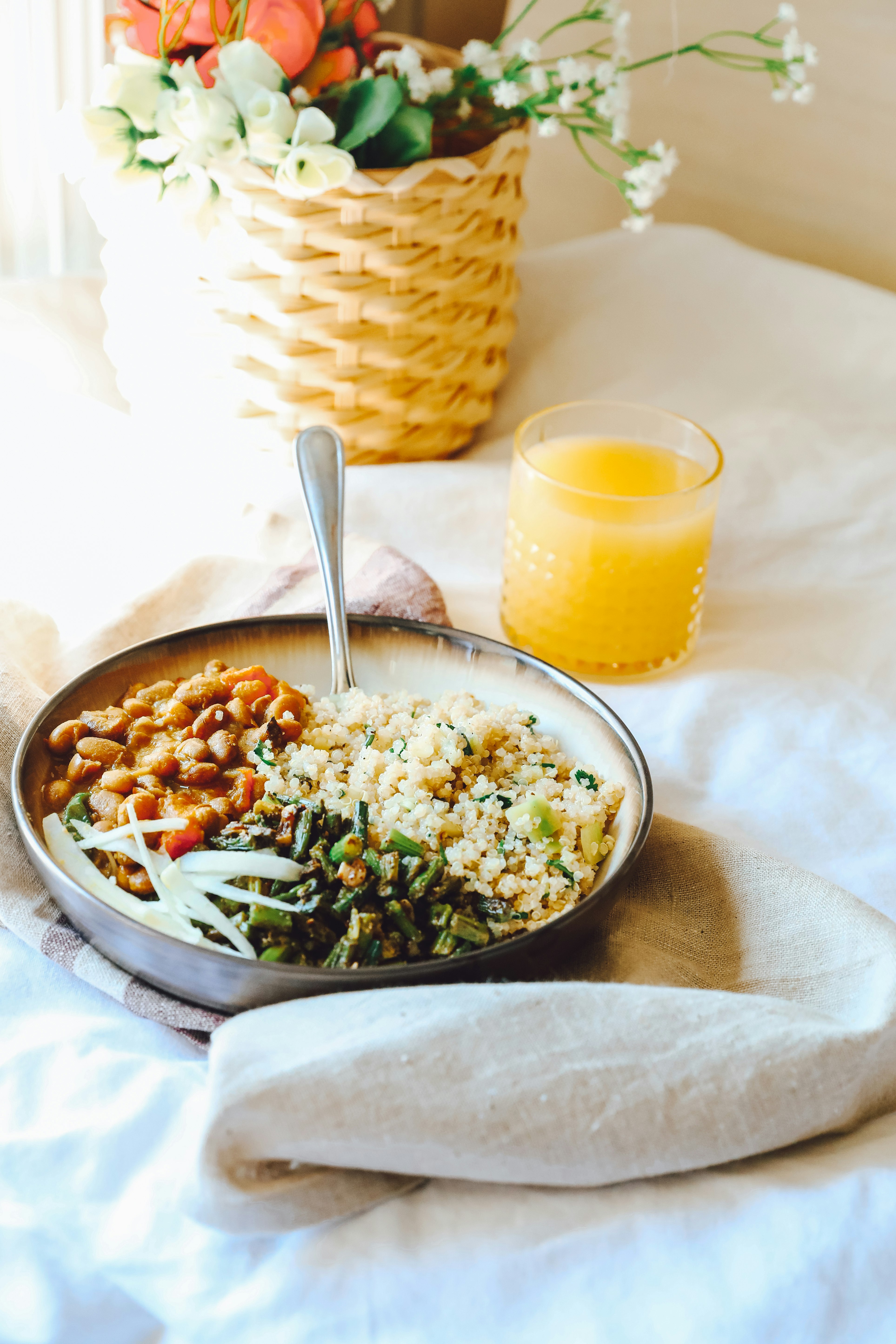 stainless steel spoon on stainless steel round bowl